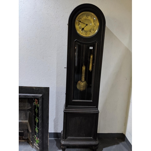 232 - An Art Deco- oak cased long case clock