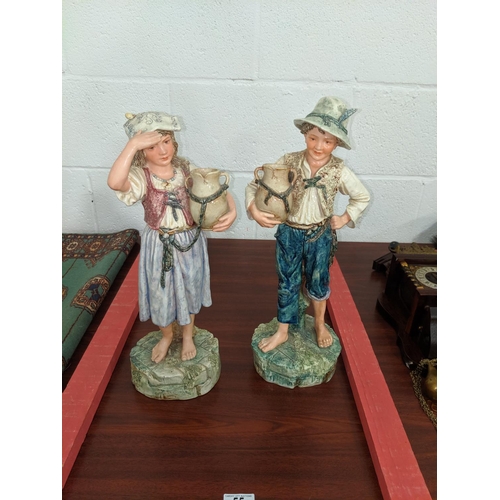 55 - A pair of large Austrian- glazed children water carrier figures - 430mm high