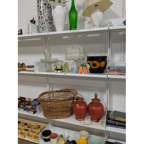 65 - Four shelves of mixed items including lamps, pots etc.