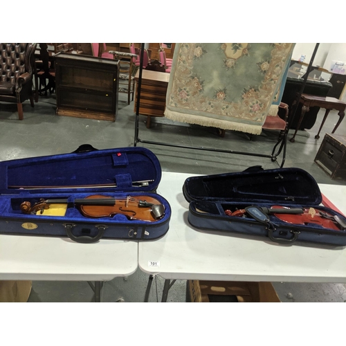 101 - Two violins in cases