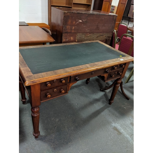 214 - A leather topped victorian desk