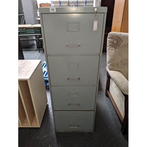 859 - A four drawer metal filing cabinet