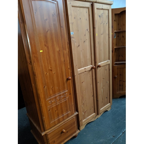 889 - A pine wardrobe and a cupboard