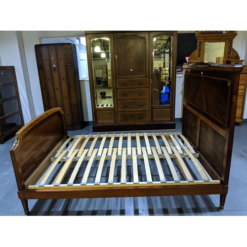 239 - An inlaid, mahogany double bed