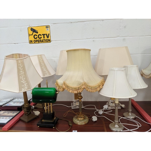 63 - Seven table lamps and a desk lamp