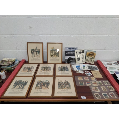 65 - 8 framed French military pictures' Knotel', military books, silk cigarette cards, aircraft cards etc... 