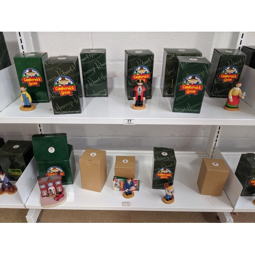 77 - Two shelves containing 12 boxed Camberwick Green figures including The Mayor etc.