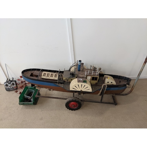 96 - A large vintage remote control paddle steam ship- for restoration