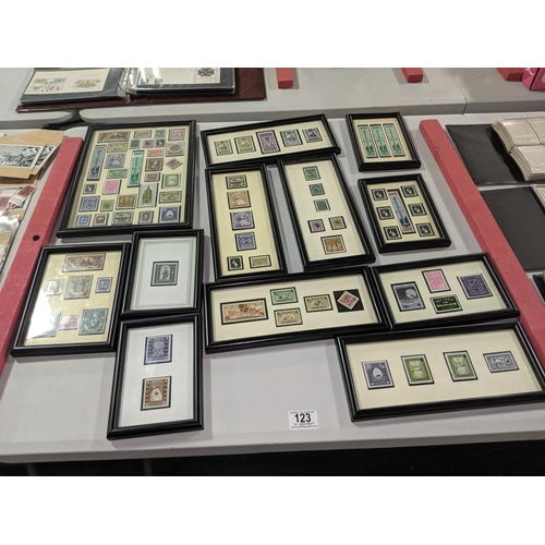 123 - A collection of framed Terry Pratchet Discworld stamps