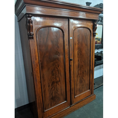 200 - A Victorian, mahogany double door wardrobe