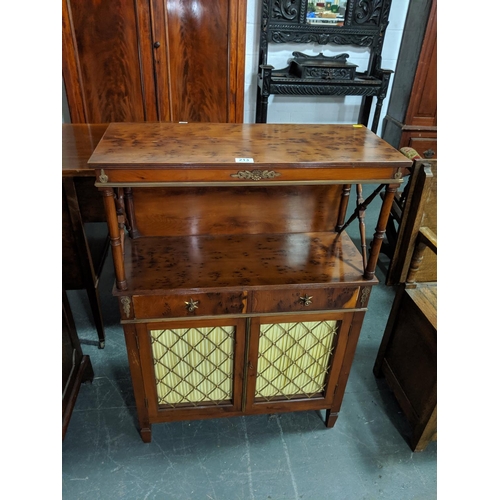 213 - A birds eye maple cabinet with oak lined drawers