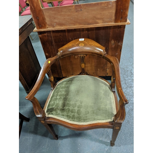 223 - An upholstered inlaid bedroom chair