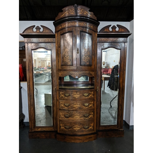 232 - A heavily inlaid and ornate Edwardian Rosewood compactum wardrobe