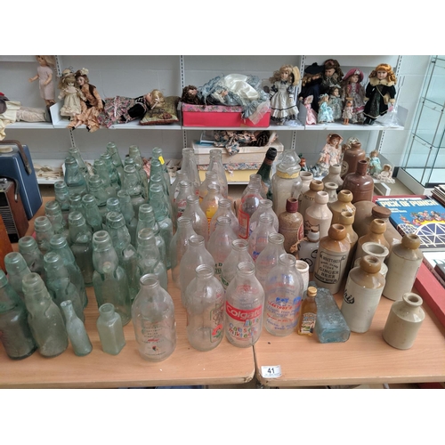 41 - A selection of vintage bottles including stone