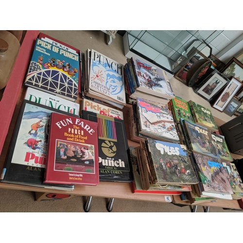 42 - A quantity of Giles books, Punch magazines and Punch books