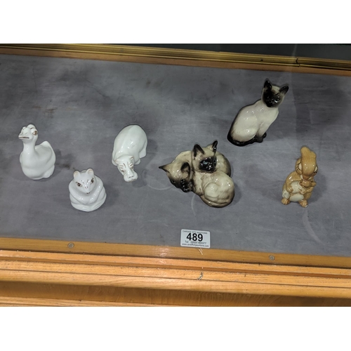 489 - A collection of small Beswick and Coalport etc. animals