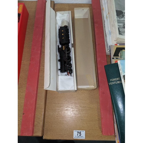75 - A Wrenn OO gauge- LMS 634 steam loco and tender- boxed and very good condition