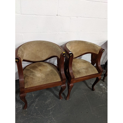 205 - Two hardwood, upholstered tub chairs