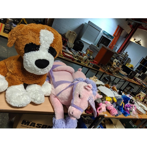 812 - A quantity of cuddly toys to include a collection of TY toys with tags