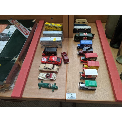 13 - A small collection of playworn Dinky buses, military ambulance etc