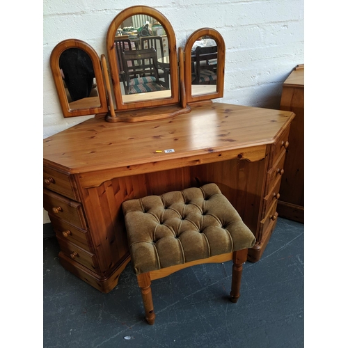 706 - A pine dressing table with mirror and stool
