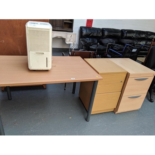 740 - Office table, two office cabinets and a dehumidifier