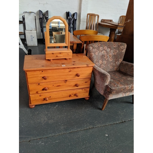 744 - A pine chest of drawers with a pine mirror and a chair