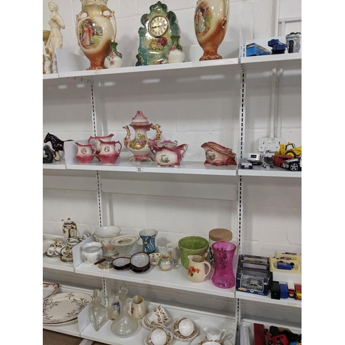 53 - Four shelves of mixed glass and china including Susie Cooper etc.