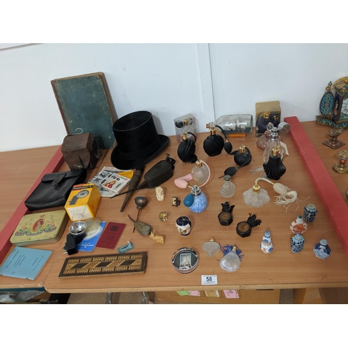 58 - Vintage items including perfume bottles, Dunn and Co top hat, bone beaver( possibly top of a cane), ... 