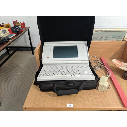 8 - An Apple Macintosh portable computer Model No. M5120