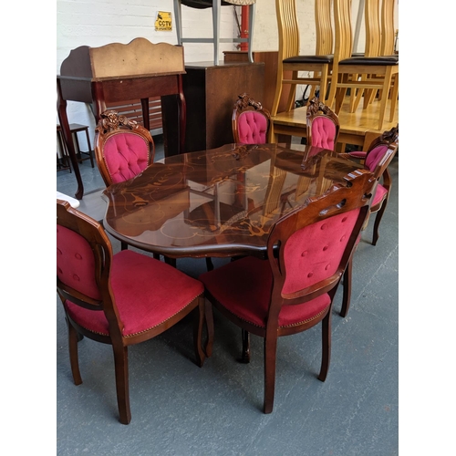 789 - An italian dining table and six chairs
