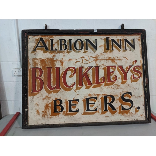 243 - An original, hanging, double sided pub sign- Albion Inn- Buckleys beers