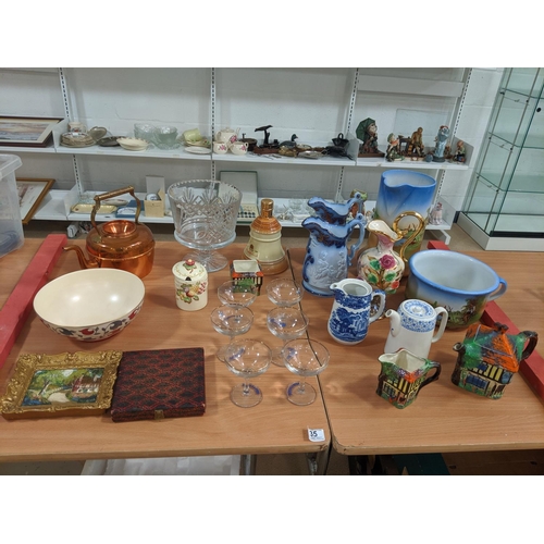 35 - A collection of china, glass and crystal to include a full Wade Bells whisky decanter, Babycham glas... 