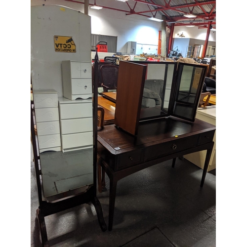 529 - A stag dressing table and a floor standing mirror