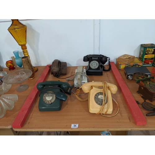 54 - Five vintage telephones including Bakelite