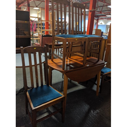 522 - A  drop leaf dining table and four chairs