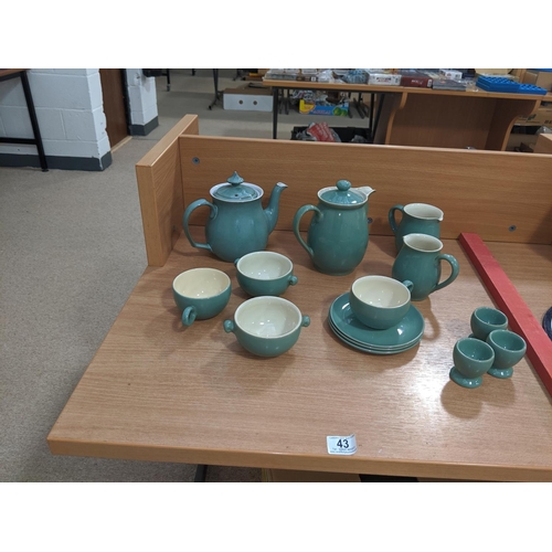 43 - A quantity of Denby pottery- teapot,cups,saucers etc.