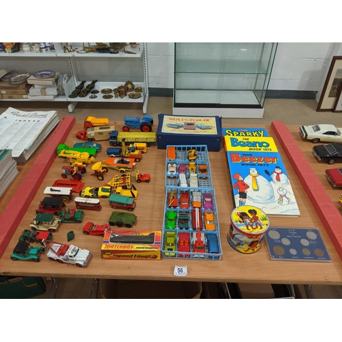 56 - A collection of playworn vehicles including Corgi, Matchbox, Lesney etc plus annuals, coins and vint... 
