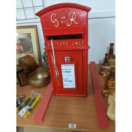 75 - A reproduction cast iron George IV postbox