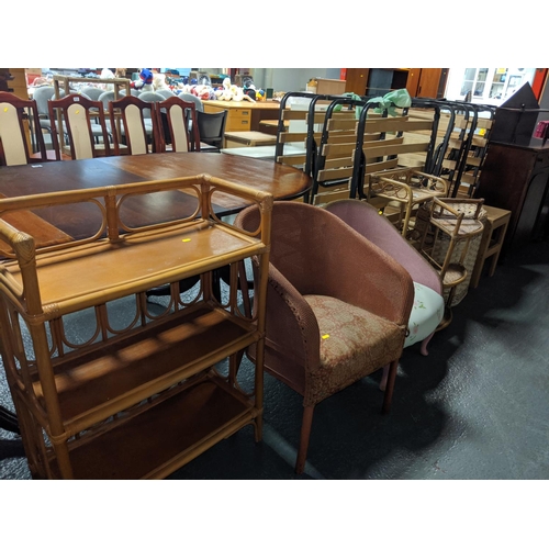 655 - Two lloyd loom style chairs, wicker shelving, small table etc.