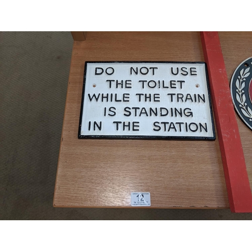 12 - A cast iron railway toilet sign