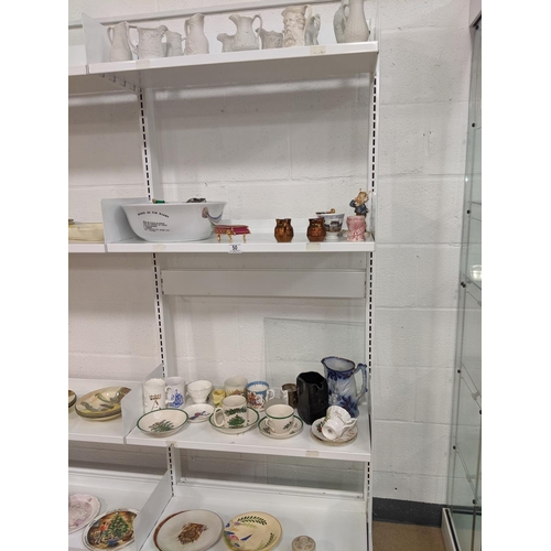 50 - Four shelves of mixed china including Port Meirion porcelain etc.