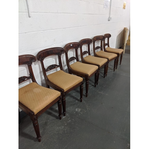 204 - A set of six mahogany,regency bar back dining chairs with carved back bar and reeded legs