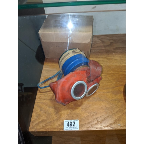492 - An early boxed gas mask