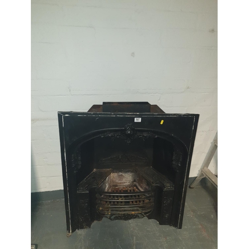 507 - A cast iron fireplace