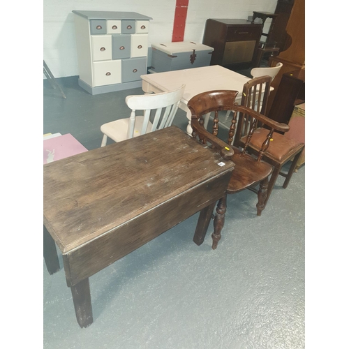 541 - An extending dining table and two chairs