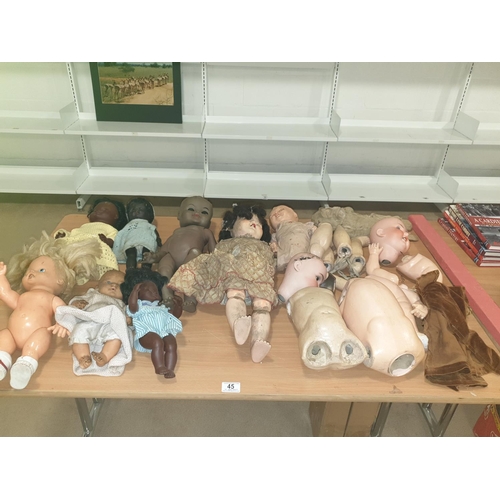 45 - A collection of vintage and earlier dolls and doll parts