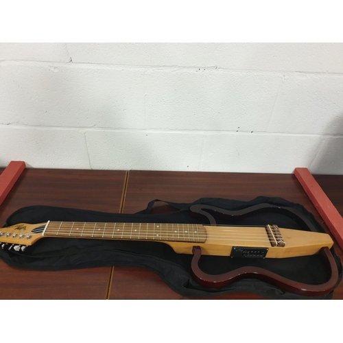 38 - A Woody Zodiac Pro Series skeleton guitar and guitar bag