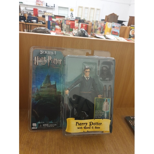 1 - A set of 4 NECA Reel toys series 1 Harry Potter and the Order of the Phoenix boxed figures