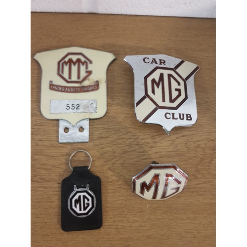 488 - An original MG Car Club Triple M Register No 552 Laudes Augete Priores Badge, A MG Car Club Badge, M... 